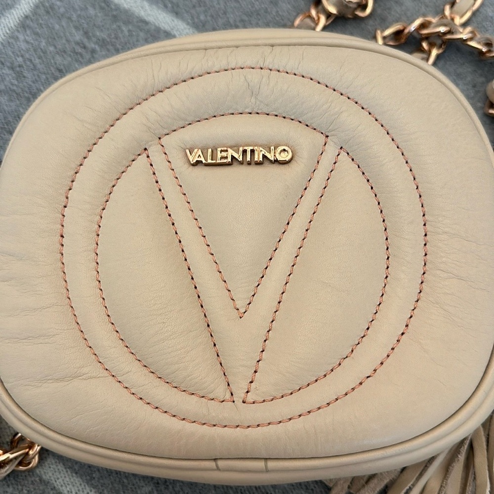 Mia nude leather crossbody bag by Mario Valentino with rose gold tone hardware